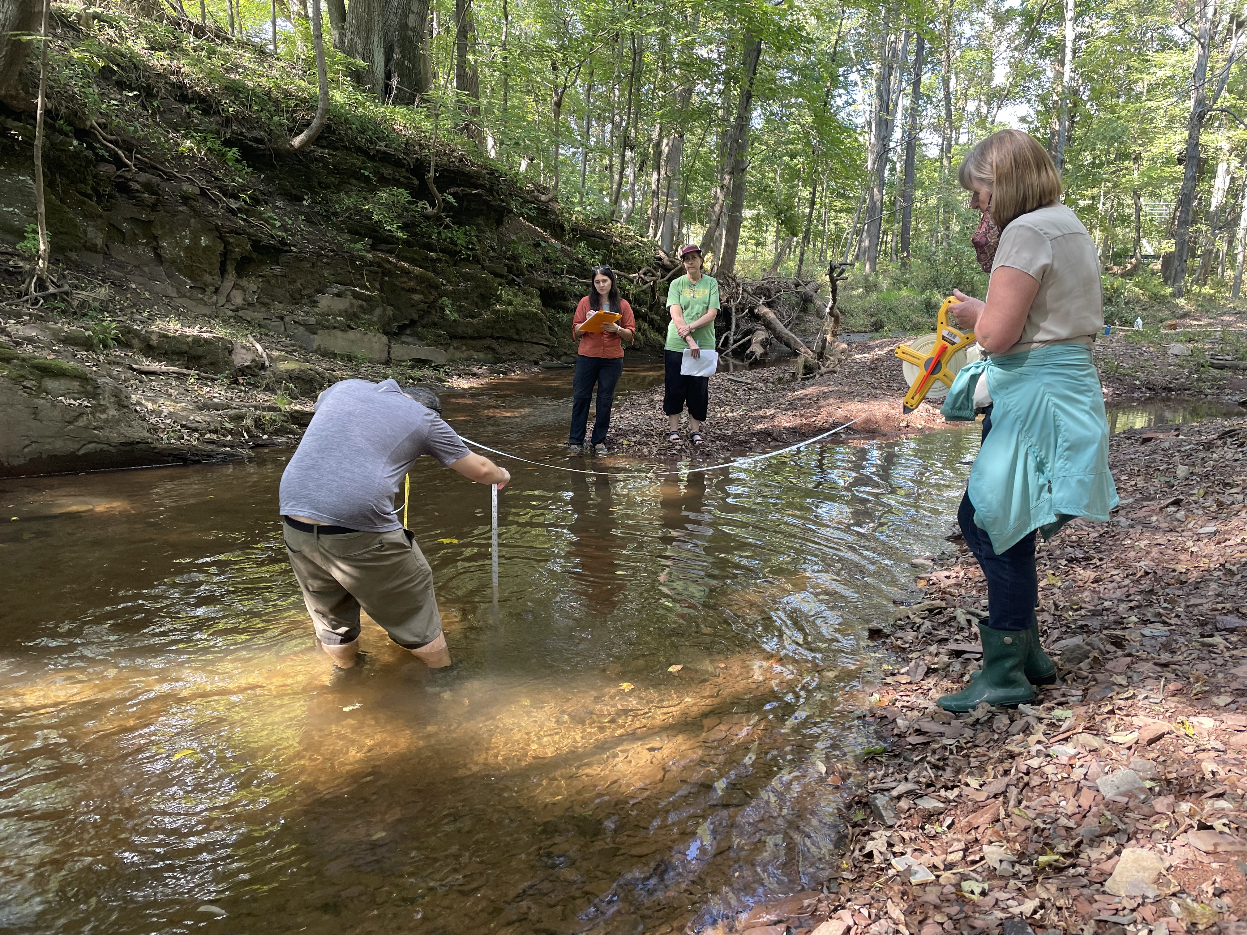 Volunteers collect physical data in Jacobs Creek, Hopewell Township, NJ in Fall 2021